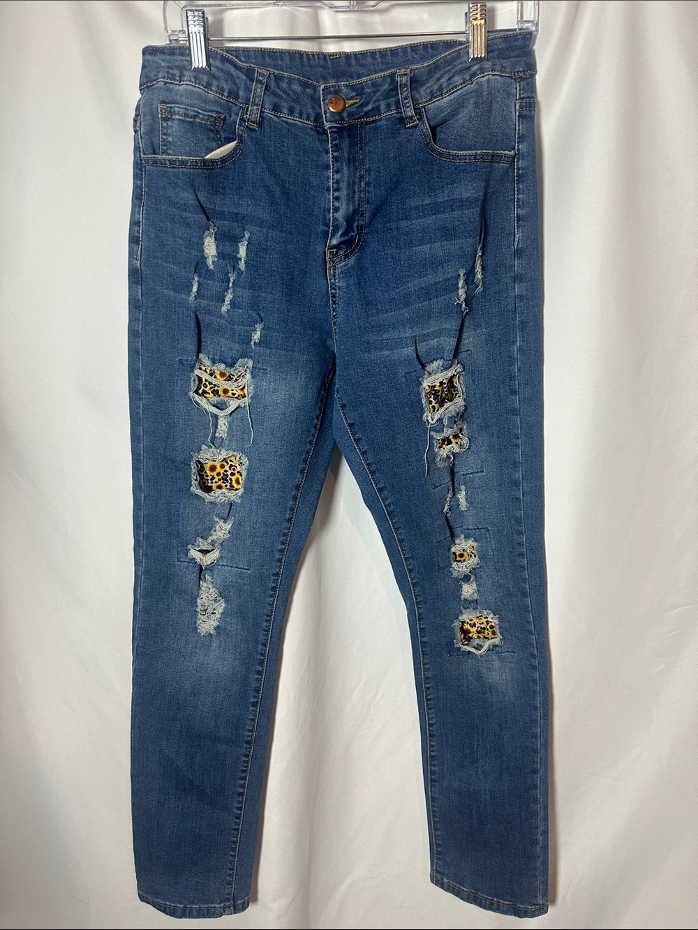 Dark Blue Women’s Distressed Jeans with Leopard/sunflower Patch Detail
